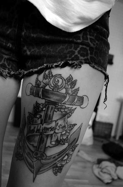 Woman leg tattoo