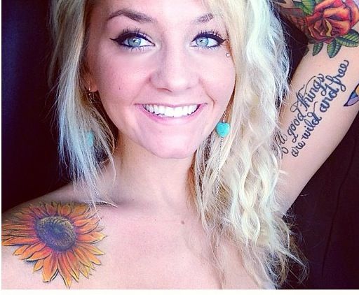 Woman sunflower tattoo