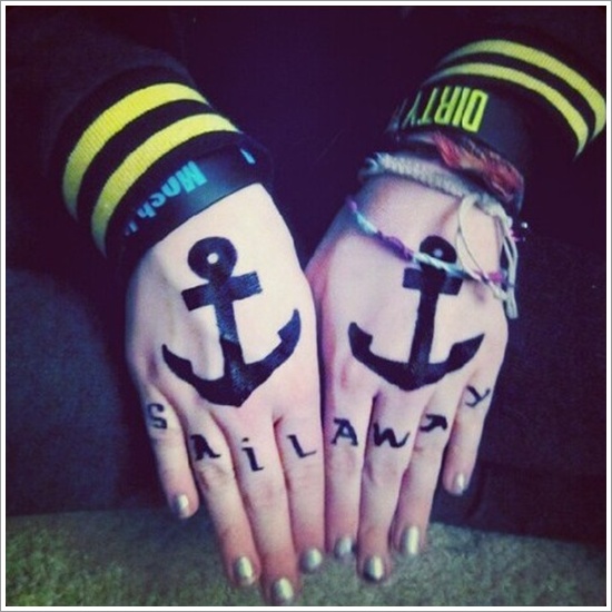 black anchor on hand