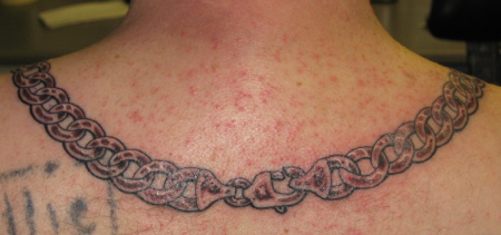 wide chain around his neck2