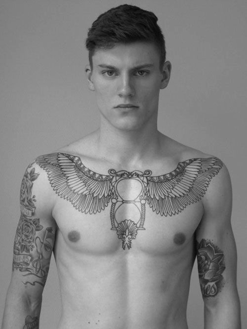 Adorable boy tattoo on chest