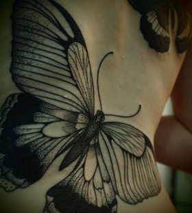 Adorable girl butterfly tattoo