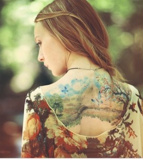 Amazing girl painting tattoo