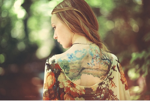 Amazing girl painting tattoo