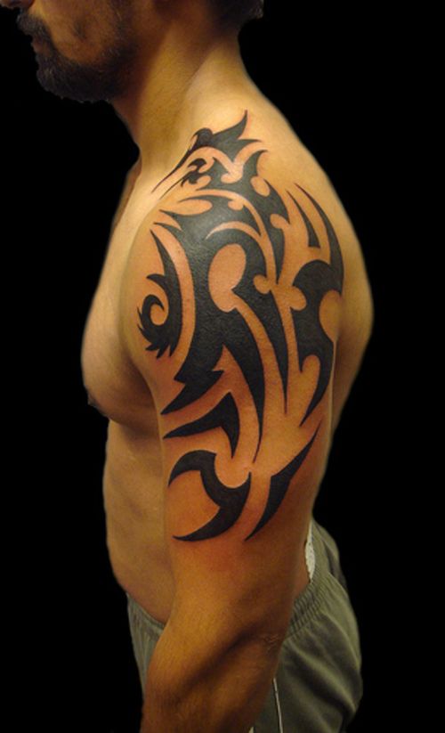 Amazing shoulder tribal tattoo