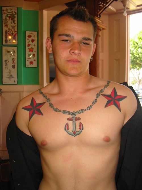 Anchor and red star tattoo