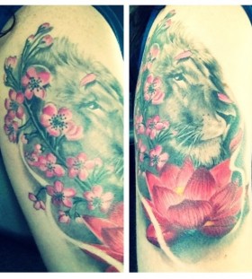 Animal and pink lotus flower tattoo