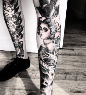 Bird and woman legs tattoo