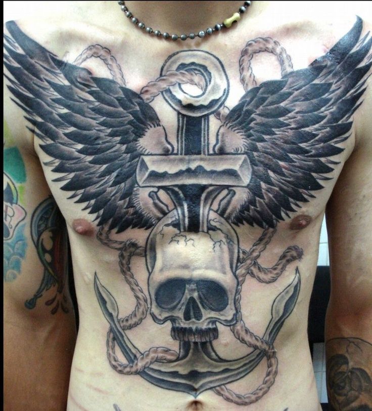 Bird wings tattoo on chest