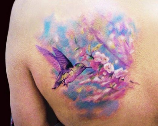 Birds and flowers tattoo by Adam Kremer
