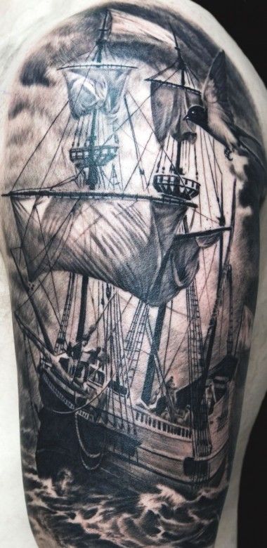 Black and grey ship tattoo