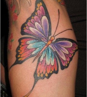 Black and red butterfly tattoo