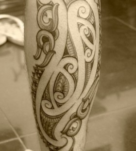 Black and white legs tattoo