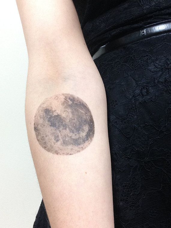 Black and white moon tattoo