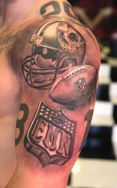 Black and white realistic football tattoo