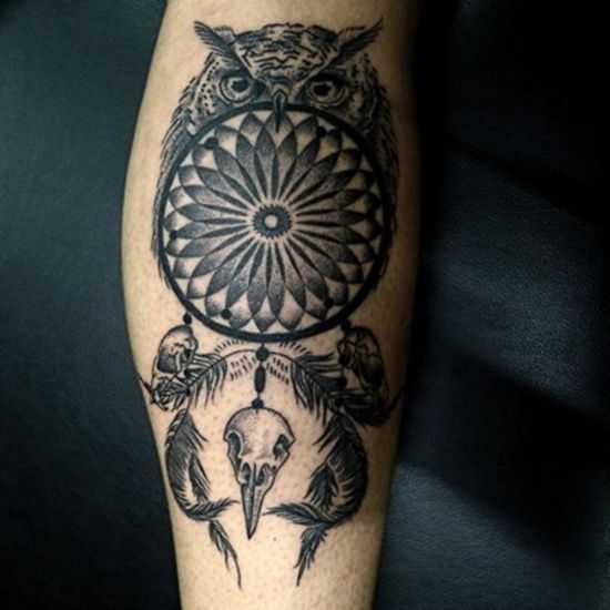 Black angry owl tattoo