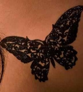 Black butterfly tattoo