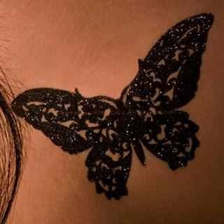 Black butterfly tattoo