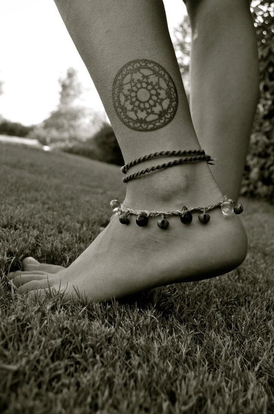 Black foot tattoo