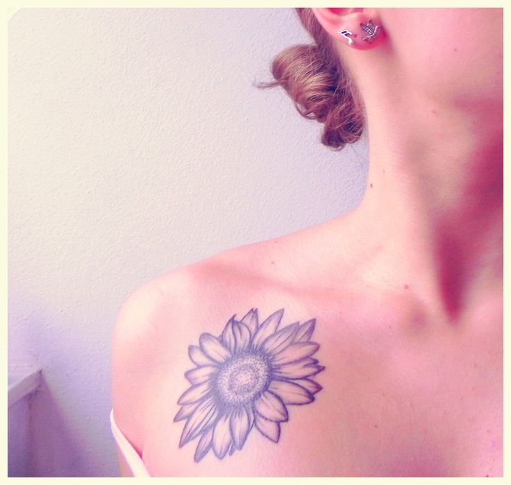 Black sunflower tattoo