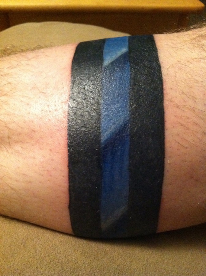 Blue and black lines tattoo