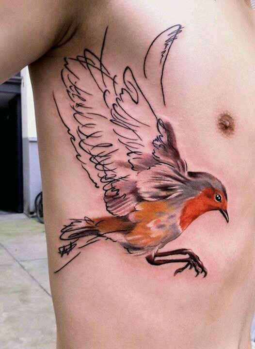 Colorful bird tattoo made by Berlin artist