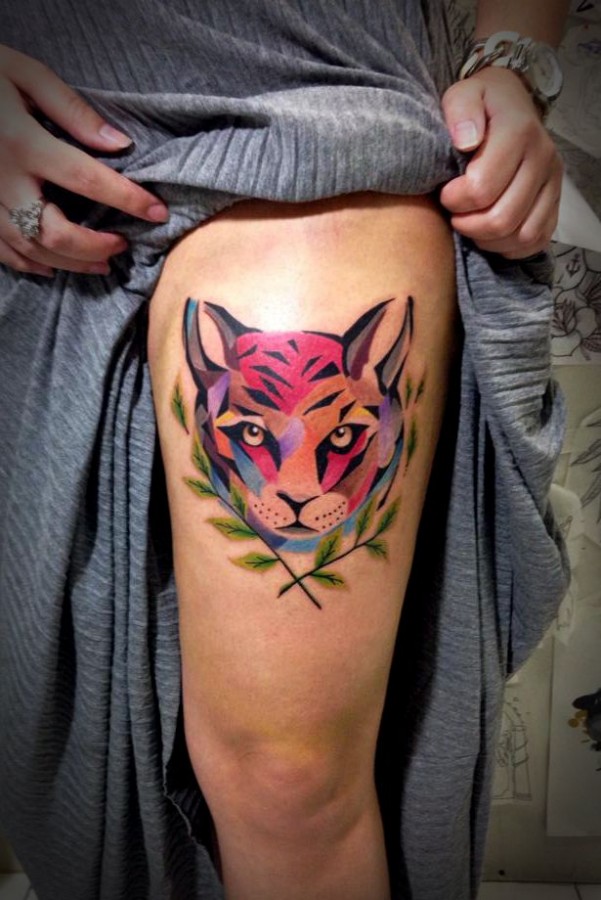 Colorful cat tattoo by Tyago Compiani