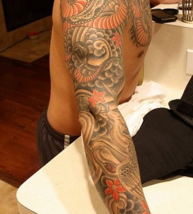 Colorful hand dragon tattoo