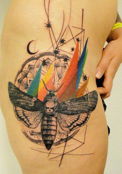 Colorful skull and insect tattoo