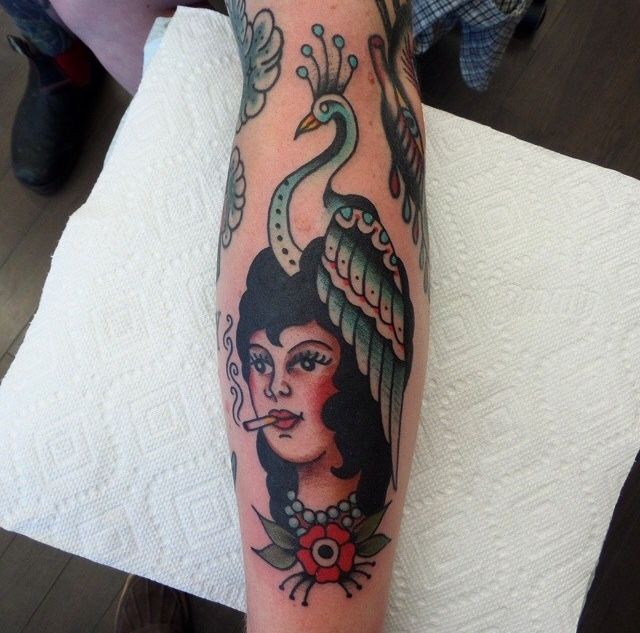 Colorful woman tattoo by Dustin Barnhart