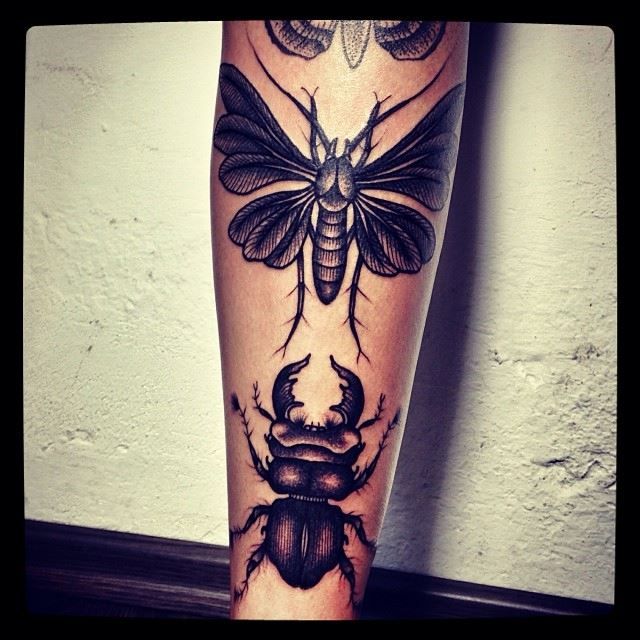 Cool insects tattoo made by Berlin artist