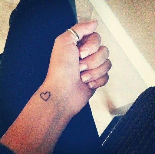 Cute small heart girl tattoo