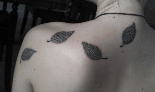 Delicate leaf tattoo