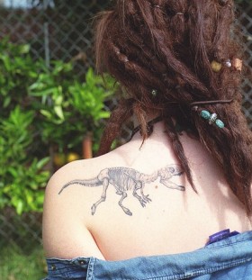 Dinosaur bones tattoo