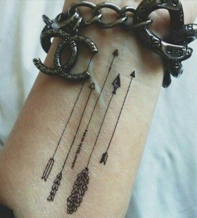 Feather arrow tattoo