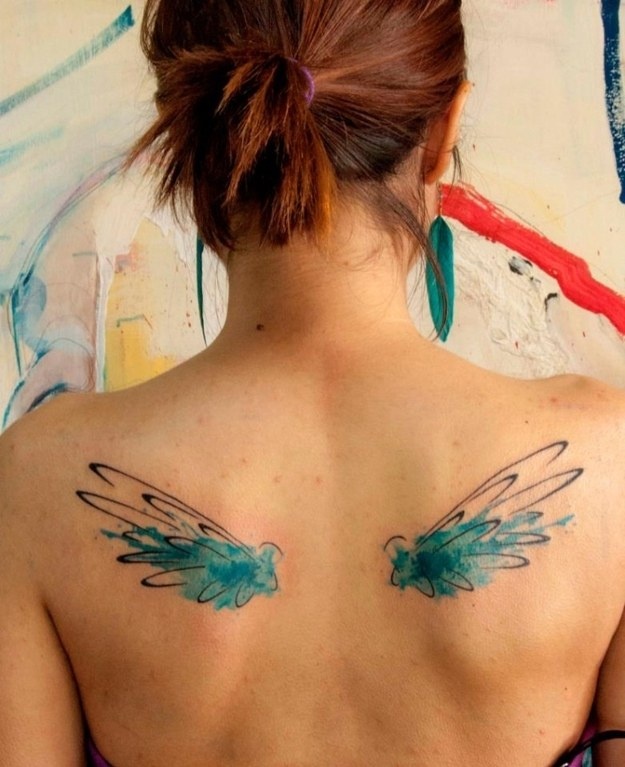 Girl wings painting tattoo