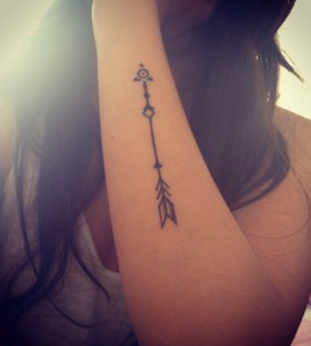 Girls hand arrow tattoo