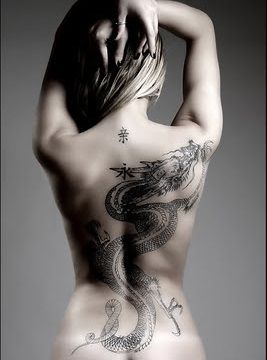 Gorgeous woman dragon tattoo