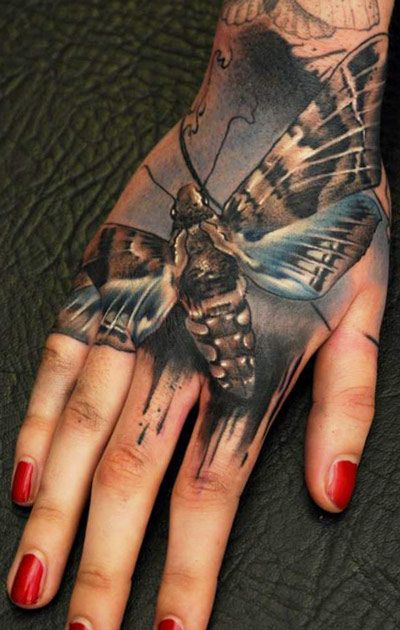 Hand insect tattoo