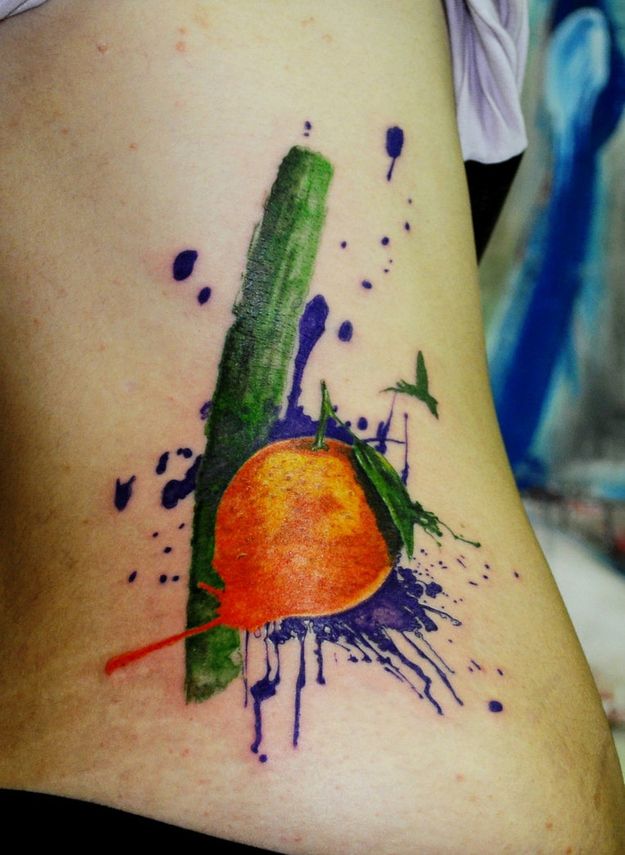 Lovely apple painting tattoo