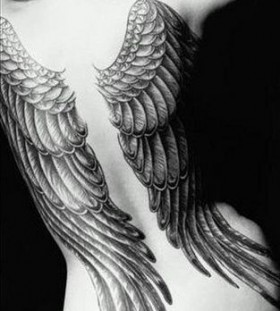 Lovely woman wings tattoo