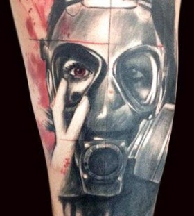 Man with mask tattoo by Adam Kremer
