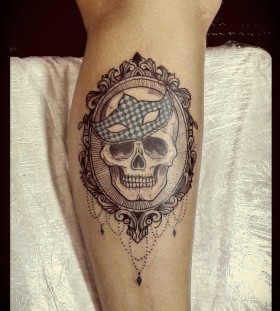 Mask and skull tattoo by Tyago Compiani