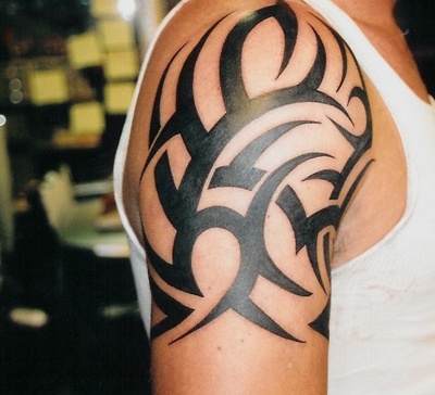 Men black tribal tattoo