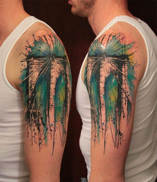 Men shoulder watercolor tattoo