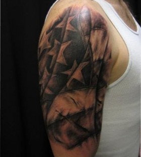 Men's hand and shoulder military style tattoos