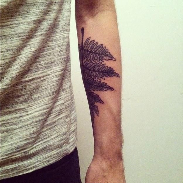 Men’s leaf tattoo