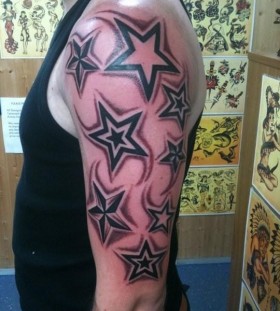 Men's shoulder star tattoo