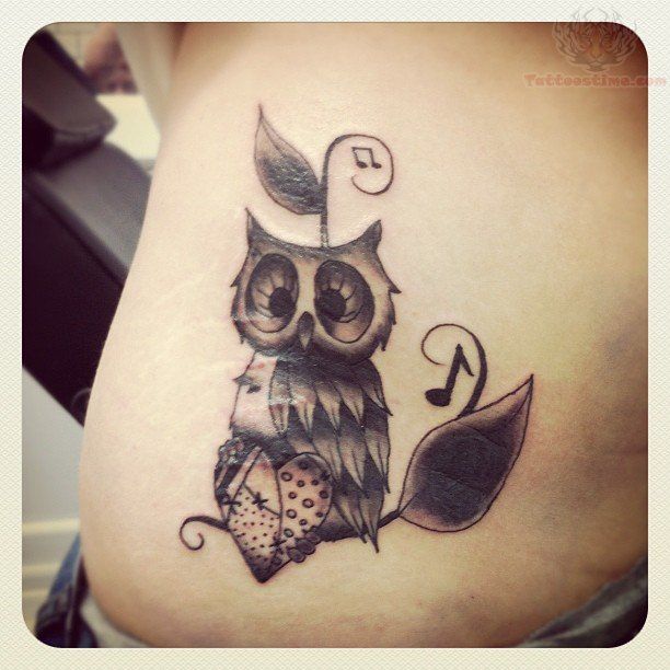 Music, heart and owl tattoo