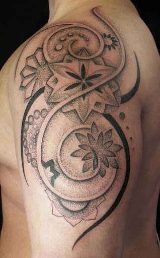 Ornaments and lotus flower tattoo